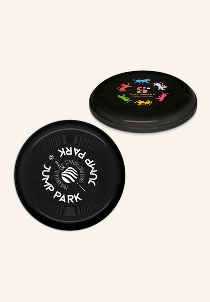 Frisbee noir vu de côté, bord plat de 24 mm d'épaisseur