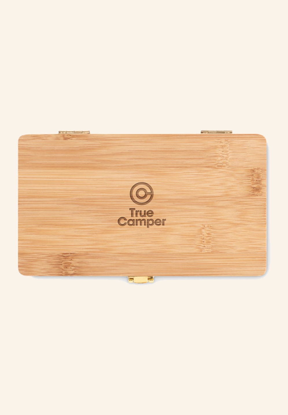 Coffret d'outils en bambou avec un logo gravé sur le couvercle